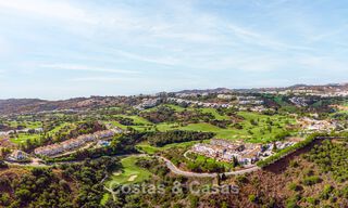 Nuevas casas adosadas de 3 dormitorios en venta en un prestigioso resort de golf en Mijas, Costa del Sol 775405 