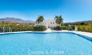 Nuevas casas adosadas de 3 dormitorios en venta en un prestigioso resort de golf en Mijas, Costa del Sol 775408 