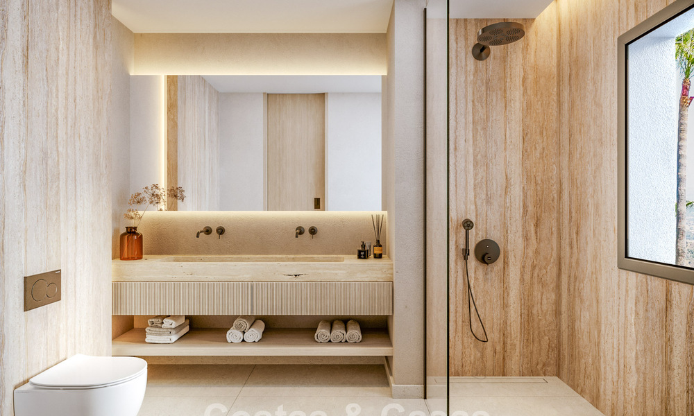 Nuevos y amplios apartamentos con vistas al golf y al mar en un estilo arquitectónico vanguardista en venta en Marbella Este 776197