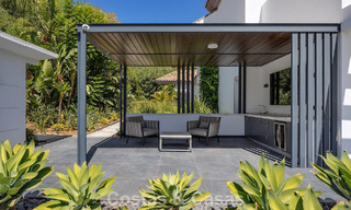 Lujosa villa de estilo mediterráneo en venta en una comunidad cerrada rodeada de naturaleza en Marbella - Benahavis 805694 