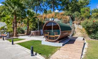 Apartamento con jardín en venta en un complejo exclusivo cerca de una gran laguna azul en la Costa del Sol 777450 