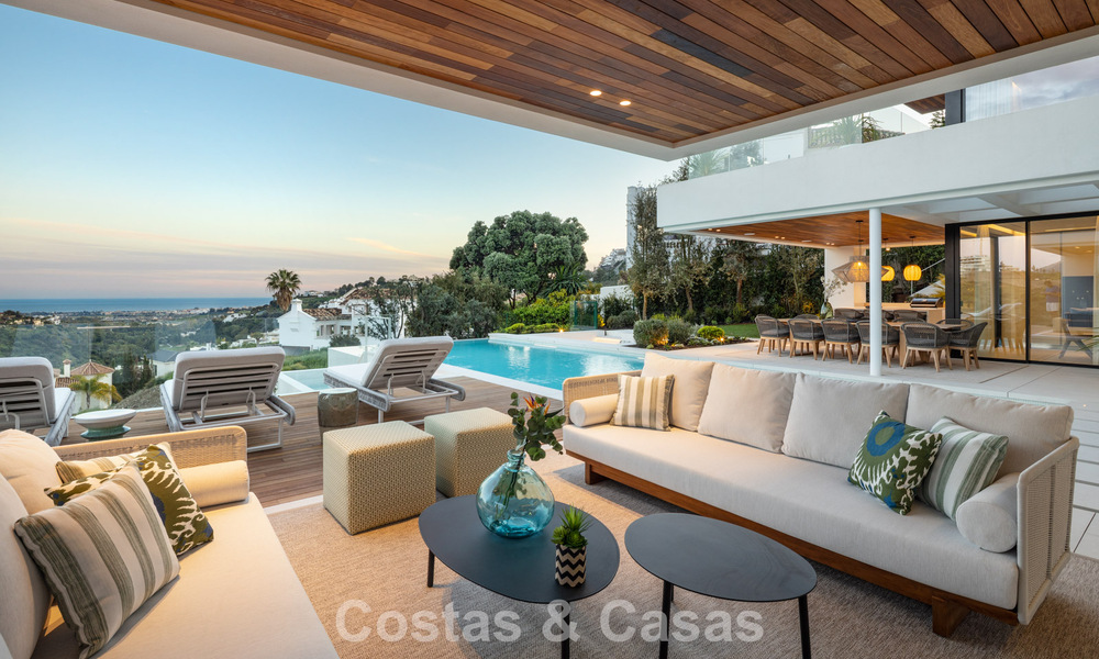 Sofisticada villa de lujo con vistas panorámicas al mar en venta en una comunidad cerrada de La Quinta, Marbella - Benahavis 778723