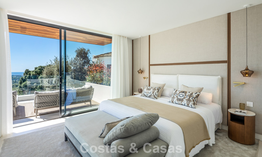 Sofisticada villa de lujo con vistas panorámicas al mar en venta en una comunidad cerrada de La Quinta, Marbella - Benahavis 800531