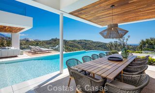 Sofisticada villa de lujo con vistas panorámicas al mar en venta en una comunidad cerrada de La Quinta, Marbella - Benahavis 800534 