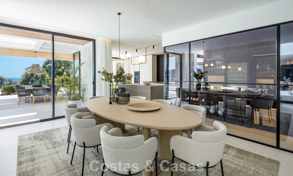 Sofisticada villa de lujo con vistas panorámicas al mar en venta en una comunidad cerrada de La Quinta, Marbella - Benahavis 800540