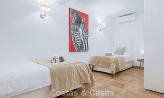 Espaciosa casa adosada en venta con vistas al mar en una urbanización cerrada en las colinas de Marbella - Benahavis 778946 