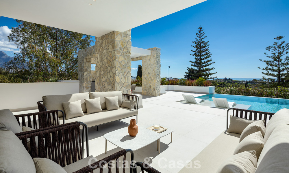 Villa de lujo modernista a estrenar en venta en la exclusiva zona residencial cerrada de La Quinta, Marbella - Benahavis 779015