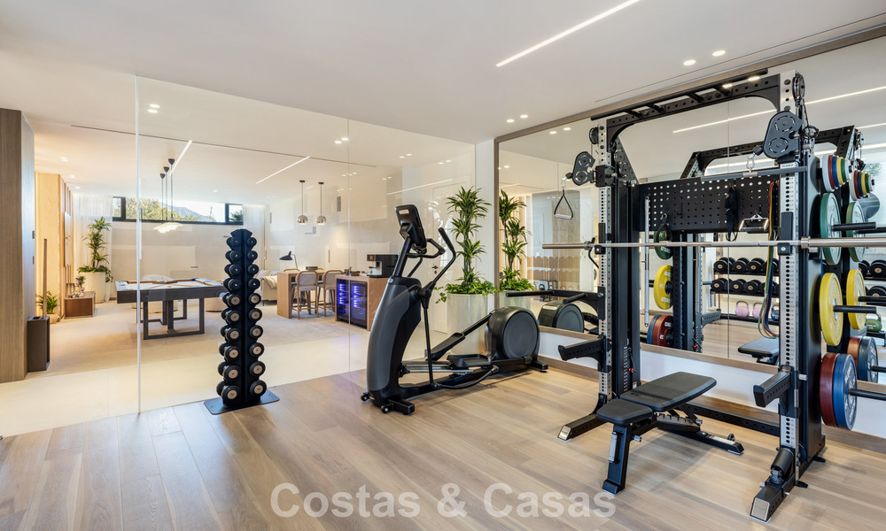 Villa de lujo modernista a estrenar en venta en la exclusiva zona residencial cerrada de La Quinta, Marbella - Benahavis 779027