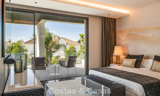 Villa de lujo moderna lista para entrar a vivir en venta a solo unos pasos de la playa en la codiciada Milla de Oro de Marbella 779376 