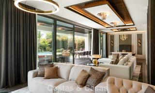 Villa de lujo moderna lista para entrar a vivir en venta a solo unos pasos de la playa en la codiciada Milla de Oro de Marbella 779377 