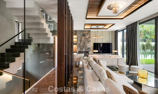 Villa de lujo moderna lista para entrar a vivir en venta a solo unos pasos de la playa en la codiciada Milla de Oro de Marbella 779379 