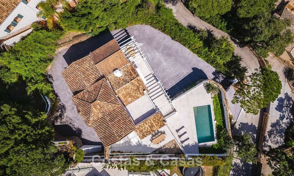 Prestigiosa villa reformada en venta en la cotizada urbanización cerrada de El Madroñal en Marbella - Benahavis 779569
