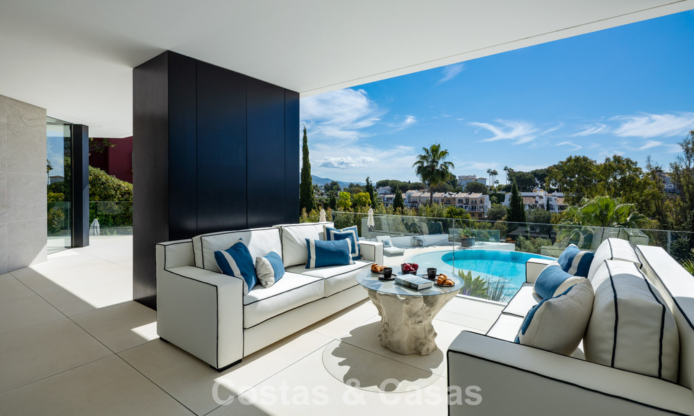 Villa de diseño vanguardista con vistas panorámicas al mar en venta en una comunidad cerrada en Benahavis - Marbella 779995