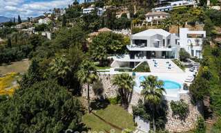 Villa de diseño vanguardista con vistas panorámicas al mar en venta en una comunidad cerrada en Benahavis - Marbella 780010 