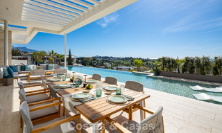 Villa de lujo de alta gama con vistas panorámicas en venta en un resort de golf en la Milla de Oro en Benahavis - Marbella 780126 