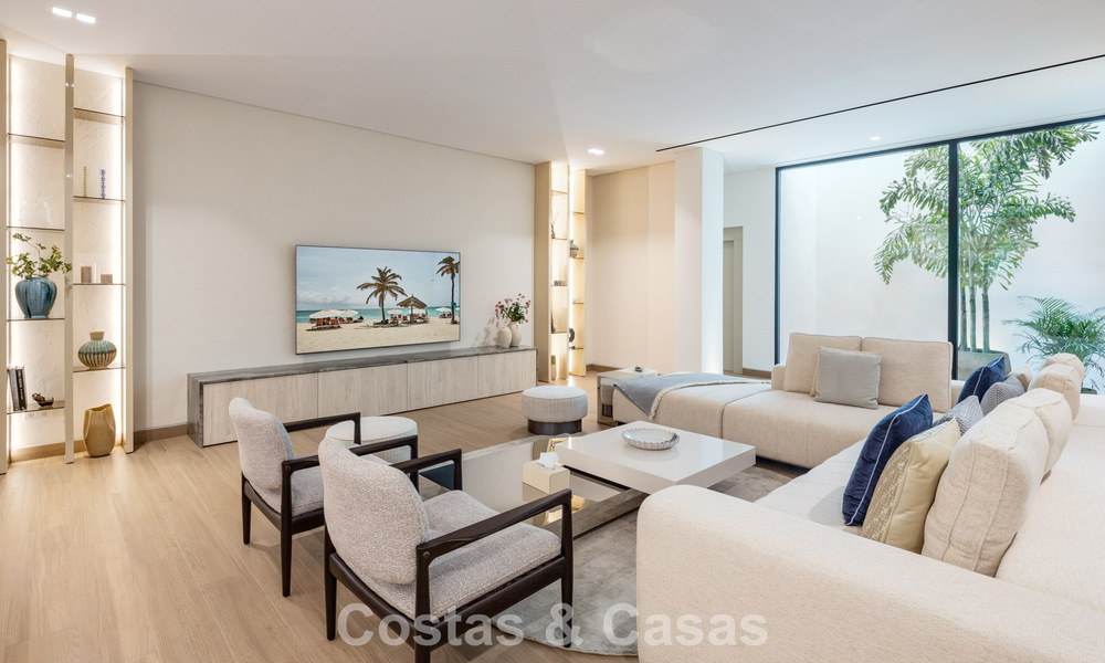 Villa de lujo de alta gama con vistas panorámicas en venta en un resort de golf en la Milla de Oro en Benahavis - Marbella 780140