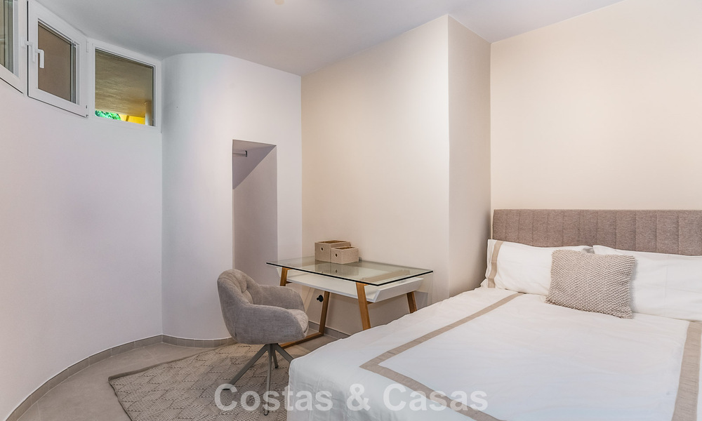 Apartamento de lujo de 4 dormitorios en venta en un complejo cerrado en el campo de golf en Nueva Andalucía, Marbella 780345