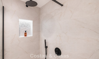 Apartamento de lujo de 4 dormitorios en venta en un complejo cerrado en el campo de golf en Nueva Andalucía, Marbella 780347 