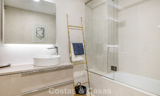 Lujoso y moderno apartamento con vistas al mar en venta en primera línea de playa en Estepona, Costa del Sol 780789 