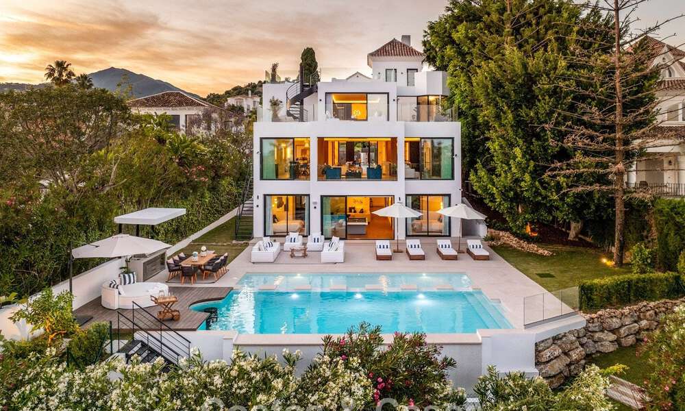 Villa de lujo de vanguardia, lista para entrar a vivir, en venta en el Valle del Golf de Nueva Andalucía, Marbella 781645