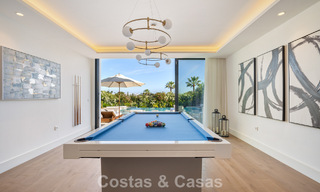 Villa de lujo de vanguardia, lista para entrar a vivir, en venta en el Valle del Golf de Nueva Andalucía, Marbella 781647 