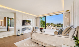 Villa de lujo de vanguardia, lista para entrar a vivir, en venta en el Valle del Golf de Nueva Andalucía, Marbella 781655 
