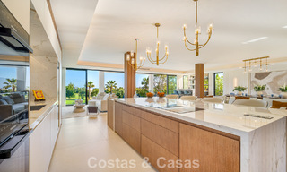 Villa de lujo de vanguardia, lista para entrar a vivir, en venta en el Valle del Golf de Nueva Andalucía, Marbella 781668 