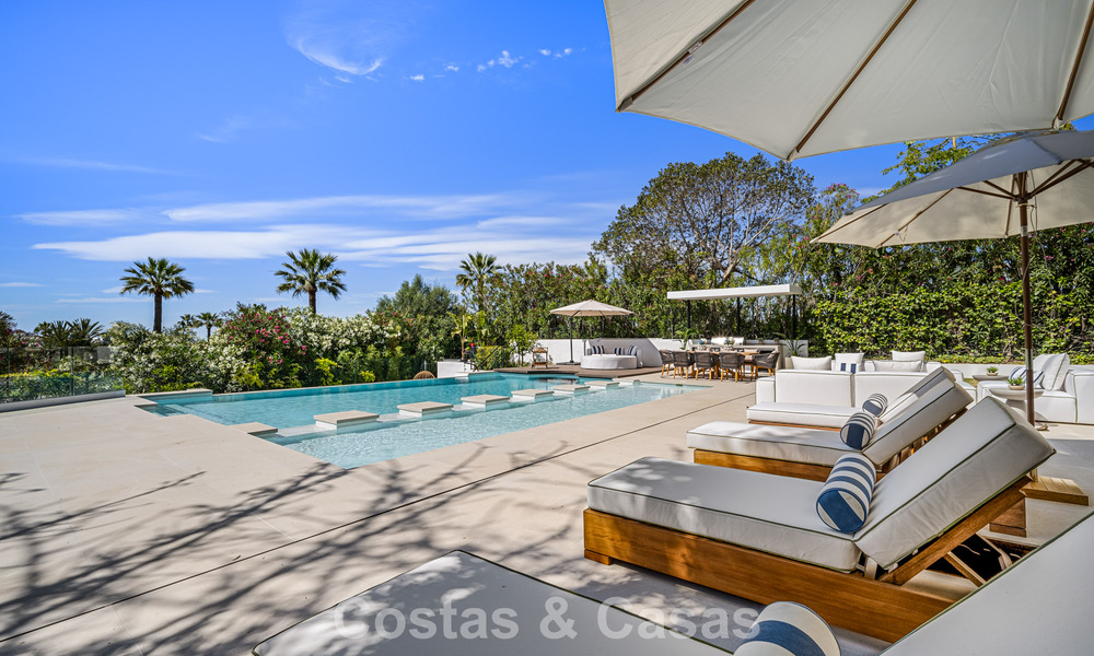 Villa de lujo de vanguardia, lista para entrar a vivir, en venta en el Valle del Golf de Nueva Andalucía, Marbella 781694
