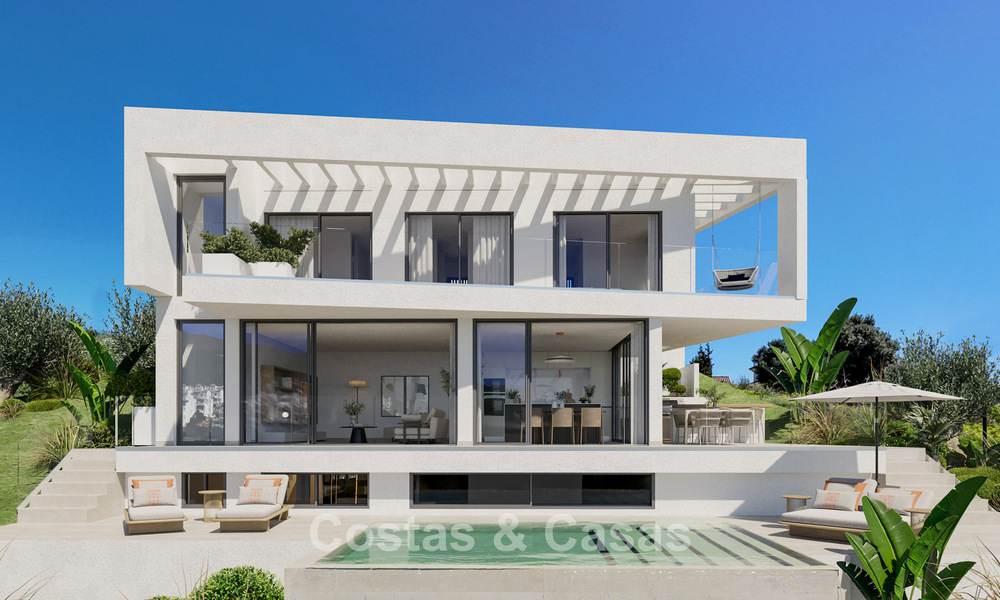 ¡Nuevo en el mercado! Villas de diseño de alta tecnología en venta en un codiciado entorno de golf cerca del centro de Estepona 781756