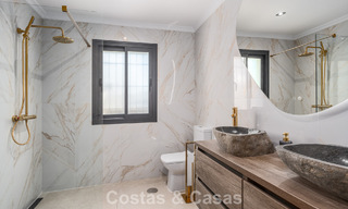 Elegante casa familiar en venta en el Valle del Golf de Nueva Andalucía, Marbella 781871 