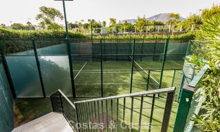 Moderno apartamento de 4 dormitorios en primera línea de playa con vistas al mar en venta en Estepona, Costa del Sol 782672 