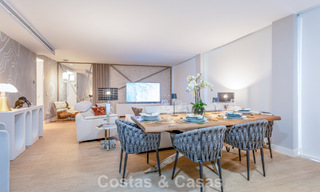 Moderno apartamento de 4 dormitorios en primera línea de playa con vistas al mar en venta en Estepona, Costa del Sol 782682 