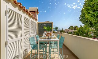 Lujosa casa adosada de estilo mediterráneo renovada en venta en primera línea de playa en la Milla de Oro de Marbella 782809 