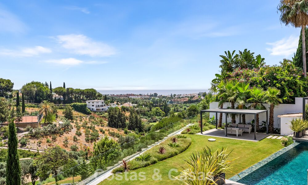 Villa en primera línea de golf con vistas al campo de golf y al mar en venta en el resort de golf de 5* en Marbella - Benahavís 783390