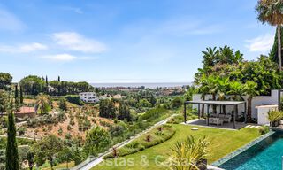 Villa en primera línea de golf con vistas al campo de golf y al mar en venta en el resort de golf de 5* en Marbella - Benahavís 783390 