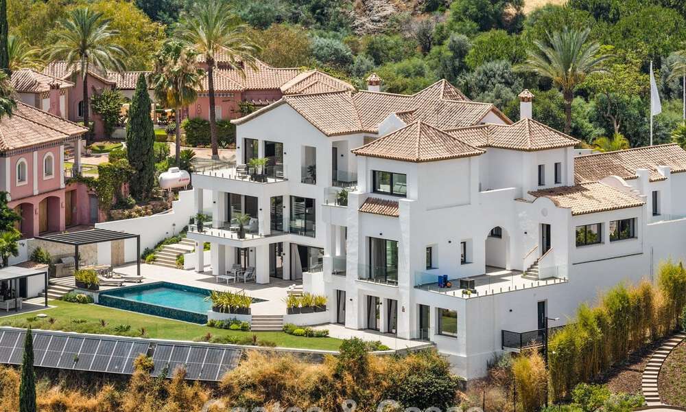 Villa en primera línea de golf con vistas al campo de golf y al mar en venta en el resort de golf de 5* en Marbella - Benahavís 783394