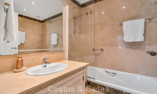 Apartamento en planta baja en venta en un complejo en primera línea de playa en la Nueva Milla de Oro, Marbella - Estepona 783682 