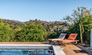 Espaciosa villa familiar con piscina privada y vistas panorámicas, enclavada en las colinas de Estepona 783737 