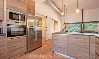 Villa de lujo de una sola planta, lista para entrar a vivir, en venta en primera línea de golf en un resort líder en Mijas, Costa del Sol 783941 
