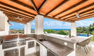 Villa de lujo de estilo español con vistas a la montaña y al mar en venta en la Nueva Milla de Oro, entre Marbella y Estepona 784065 