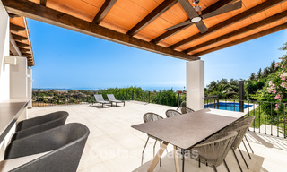 Villa de lujo de estilo español con vistas a la montaña y al mar en venta en la Nueva Milla de Oro, entre Marbella y Estepona 784066 