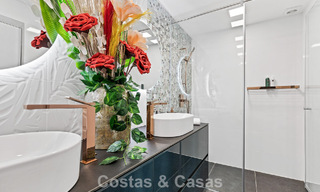 Apartamento de lujo modernizado con vistas panorámicas al mar en venta en un resort de golf en Marbella - Benahavís 784838 