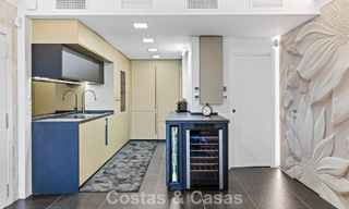 Apartamento de lujo modernizado con vistas panorámicas al mar en venta en un resort de golf en Marbella - Benahavís 784853 