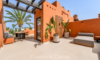 Prestigiosa casa adosada en venta en un exclusivo complejo residencial en la Milla de Oro de Marbella 785429 