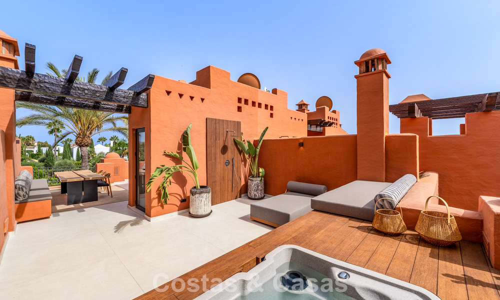 Prestigiosa casa adosada en venta en un exclusivo complejo residencial en la Milla de Oro de Marbella 785430