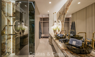 Apartamento de lujo en primera línea de playa, listo para entrar a vivir, en la Nueva Milla de Oro, entre Marbella y Estepona 785974 