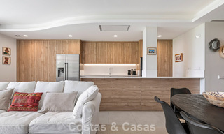 Apartamento en planta baja, con un amplio jardín privado, en venta en un resort de golf en Marbella - Benahavís 785884 