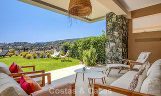Apartamento en planta baja, con un amplio jardín privado, en venta en un resort de golf en Marbella - Benahavís 785899 