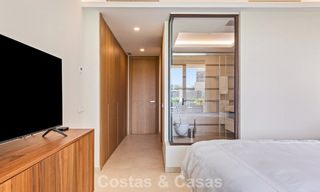 Apartamento en planta baja, con un amplio jardín privado, en venta en un resort de golf en Marbella - Benahavís 785903 