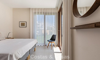 Apartamento en planta baja, con un amplio jardín privado, en venta en un resort de golf en Marbella - Benahavís 785906 